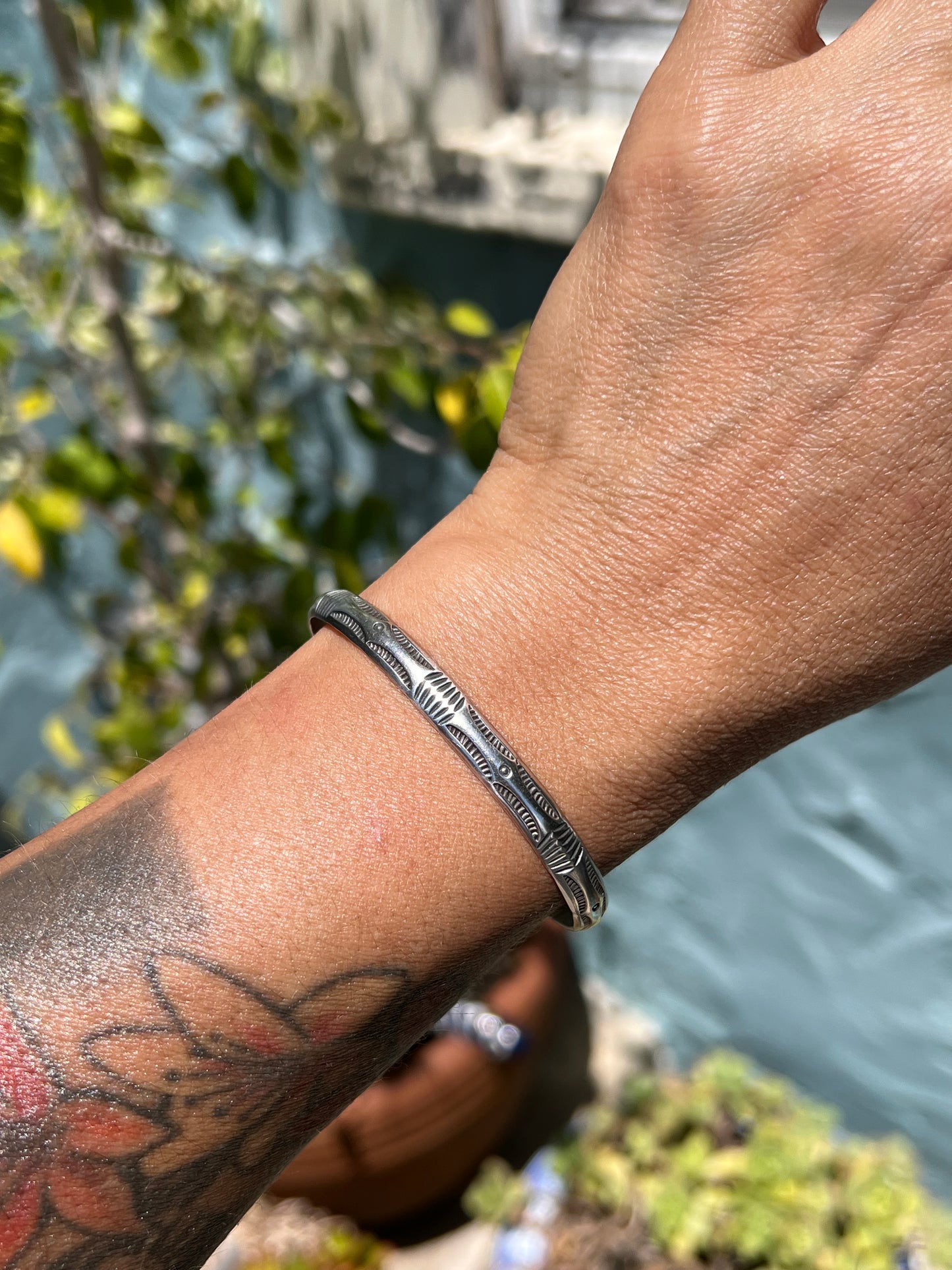 Stamped stacker cuff