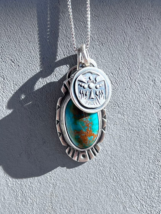 Green Turquoise and thunderbird Pendant