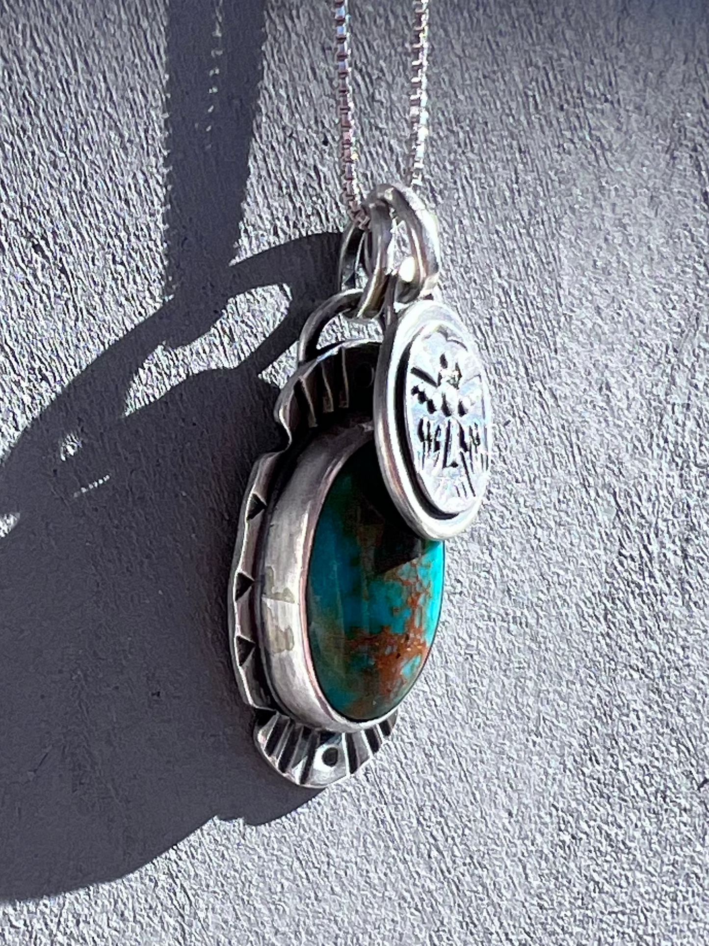 Green Turquoise and thunderbird Pendant